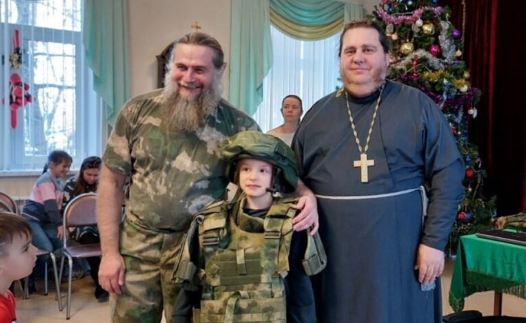 A priest of the Russian Orthodox Church conducts “tactical training” inside a church
